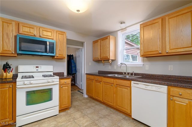 3975 Eastway Rd, South Euclid, OH 44118 - kitchen featuring white appliances and a sink