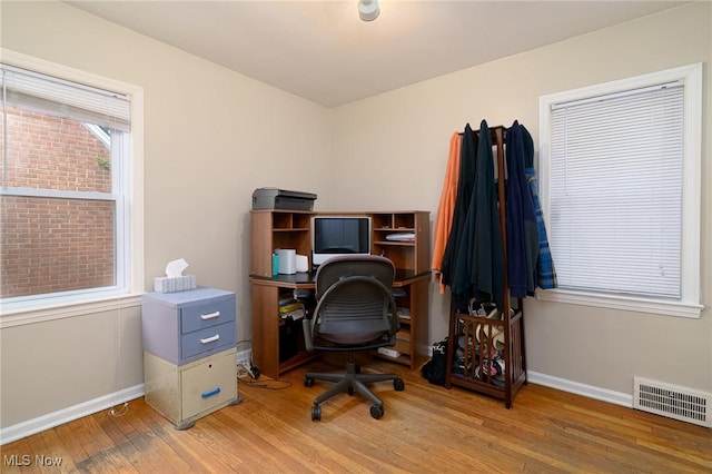 3975 Eastway Rd, South Euclid, OH 44118 - home office with light wood-style flooring and baseboards