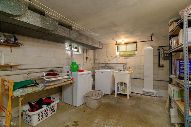3975 Eastway Rd, South Euclid, OH 44118 - unfinished below grade area featuring washing machine and dryer and concrete block wall