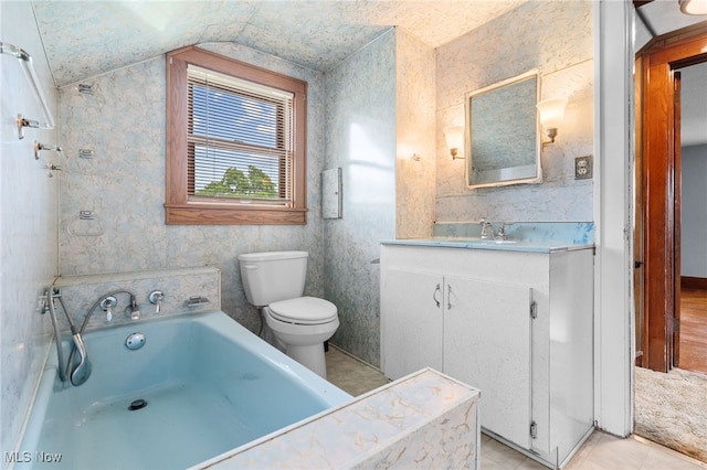 11861 Moffitt St SW, Massillon, OH 44647 - full bath featuring a garden tub, vanity, and lofted ceiling