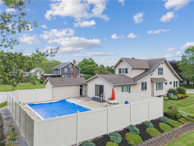 11861 Moffitt St SW, Massillon, OH 44647 - view of pool with a fenced backyard and a patio