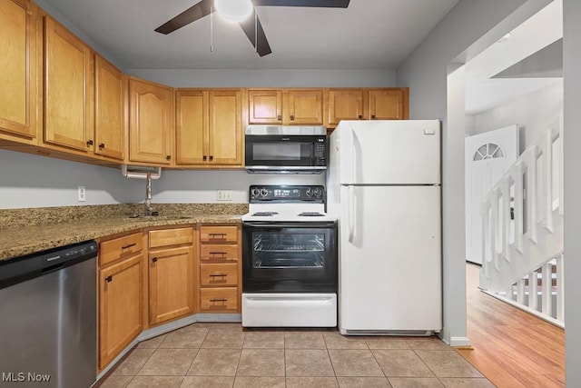 713 Gold Leaf, Streetsboro, OH 44241 - kitchen with appliances with stainless steel finishes, a ceiling fan, light tile patterned flooring, and light stone countertops