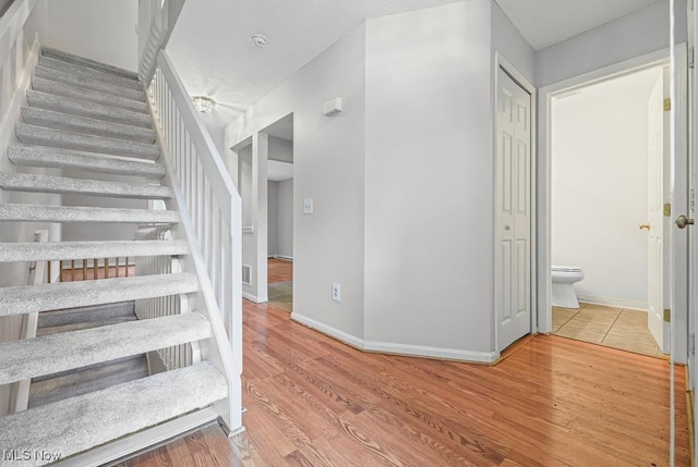713 Gold Leaf, Streetsboro, OH 44241 - stairs with wood finished floors and baseboards