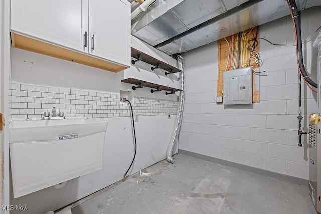 713 Gold Leaf, Streetsboro, OH 44241 - laundry area featuring electric panel, cabinet space, concrete block wall, and hookup for a washing machine