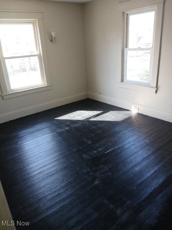 1954 Everett Ave, Youngstown, OH 44514 - spare room featuring dark wood finished floors