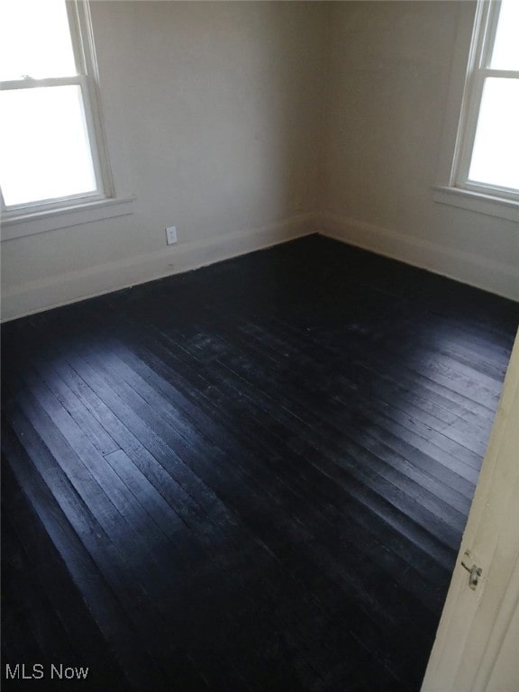 1954 Everett Ave, Youngstown, OH 44514 - empty room with dark wood-style floors and baseboards