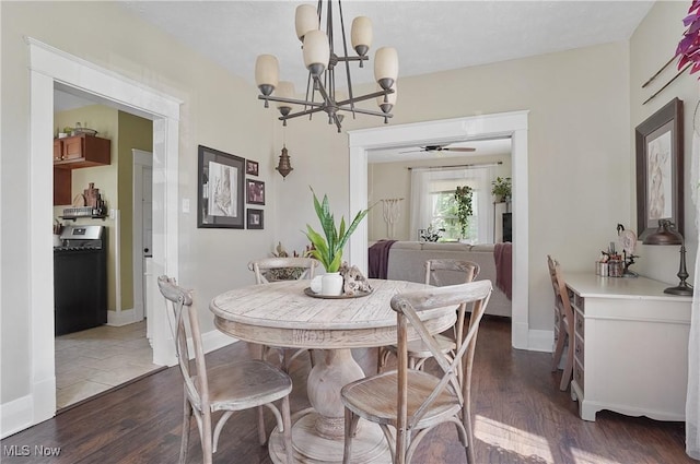 583 E 7th St, Salem, OH 44460 - dining area with a chandelier, dark wood-style floors, and a ceiling fan