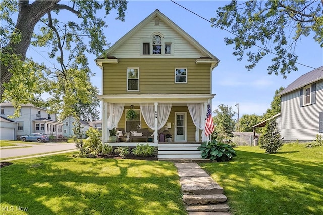 583 E 7th St, Salem, OH 44460 - view of front of house with a porch and a front yard