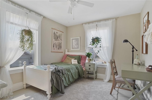 583 E 7th St, Salem, OH 44460 - carpeted bedroom with multiple windows and ceiling fan