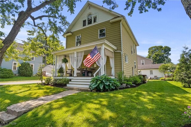 583 E 7th St, Salem, OH 44460 - traditional style home with covered porch and a front yard