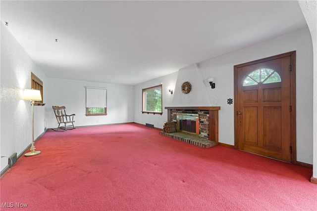 5352 Hills And Dales Rd NW, Canton, OH 44708 - unfurnished living room featuring carpet floors and a fireplace