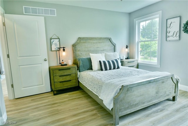 125 Fitch Blvd Unit 254, Youngstown, OH 44515 - bedroom featuring light wood-type flooring and baseboards