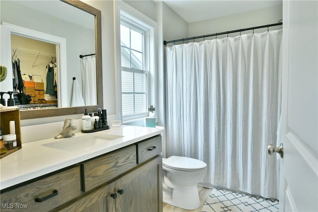 125 Fitch Blvd Unit 254, Youngstown, OH 44515 - full bathroom featuring vanity and a walk in closet