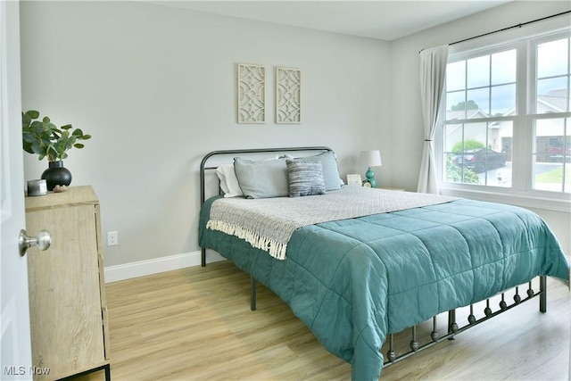 125 Fitch Blvd Unit 254, Youngstown, OH 44515 - bedroom with light wood-style floors and baseboards
