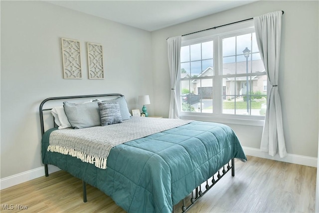 125 Fitch Blvd Unit 254, Youngstown, OH 44515 - bedroom with baseboards and wood finished floors