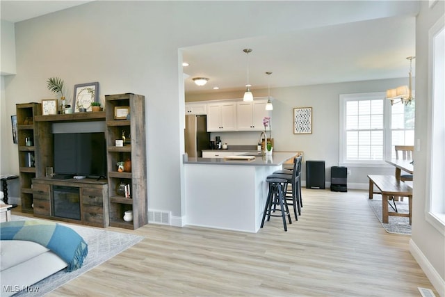 125 Fitch Blvd Unit 254, Youngstown, OH 44515 - living area featuring light wood-style floors, a chandelier, and recessed lighting