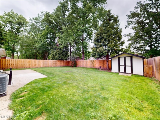 451 Edgewood Cir, Berea, OH 44017 - fenced backyard with a storage shed and a patio area