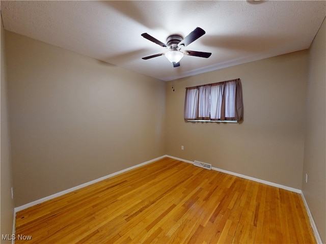 451 Edgewood Cir, Berea, OH 44017 - unfurnished room with light wood-style flooring and ceiling fan