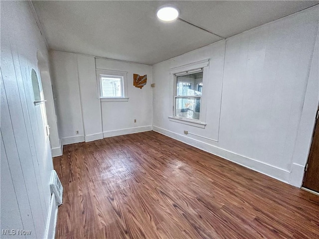 421 E Thornton St, Akron, OH 44311 - empty room with wood finished floors and baseboards