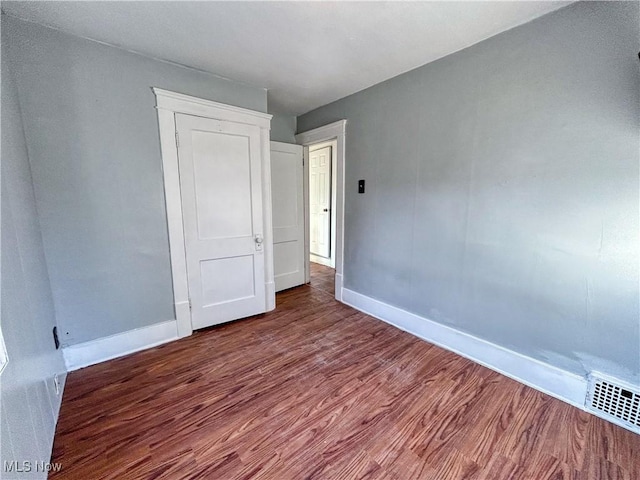 421 E Thornton St, Akron, OH 44311 - unfurnished room with baseboards and wood finished floors