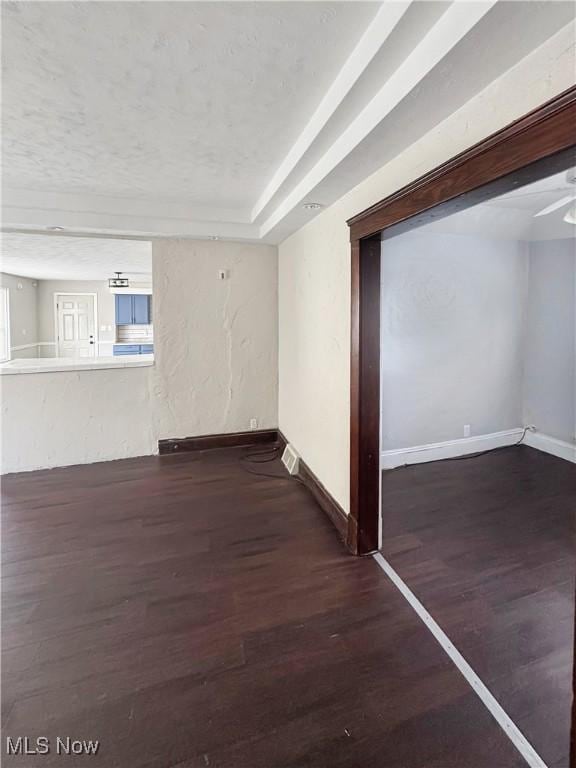 4017 E 54th St, Newburgh Heights, OH 44105 - empty room featuring wood finished floors and baseboards
