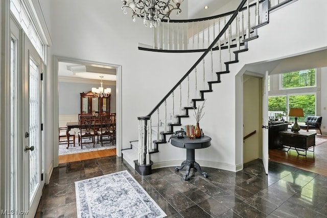 1497 Hunting Hollow Dr, Hudson, OH 44236 - entrance foyer with a chandelier, a high ceiling, and stairs