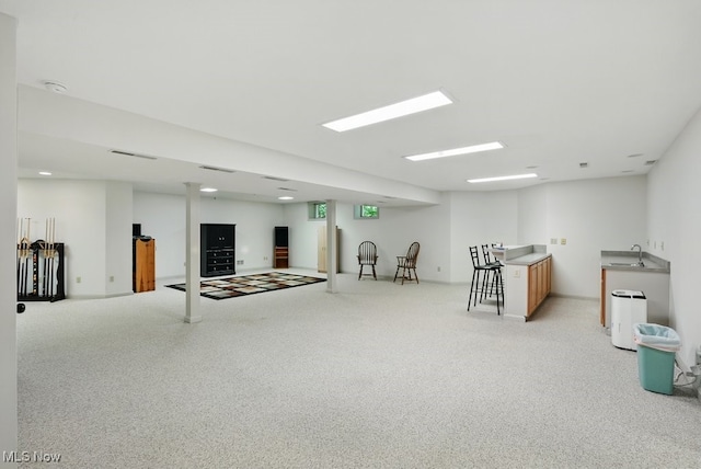 1497 Hunting Hollow Dr, Hudson, OH 44236 - finished basement with carpet flooring and a community bar