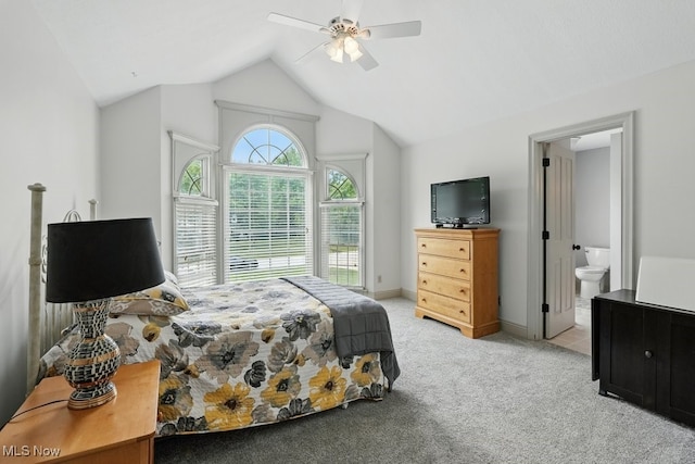 1497 Hunting Hollow Dr, Hudson, OH 44236 - bedroom with light colored carpet, lofted ceiling, ceiling fan, and ensuite bath