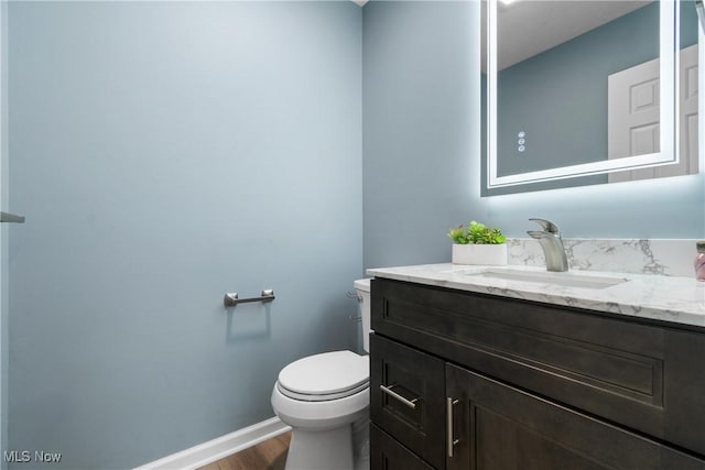 4270 Sir Robert Ave, North Royalton, OH 44133 - half bathroom with wood finished floors and vanity