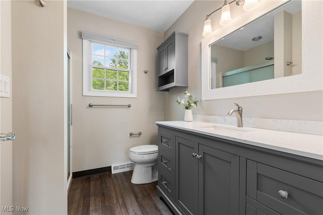 4270 Sir Robert Ave, North Royalton, OH 44133 - full bathroom with vanity, wood finished floors, and a stall shower