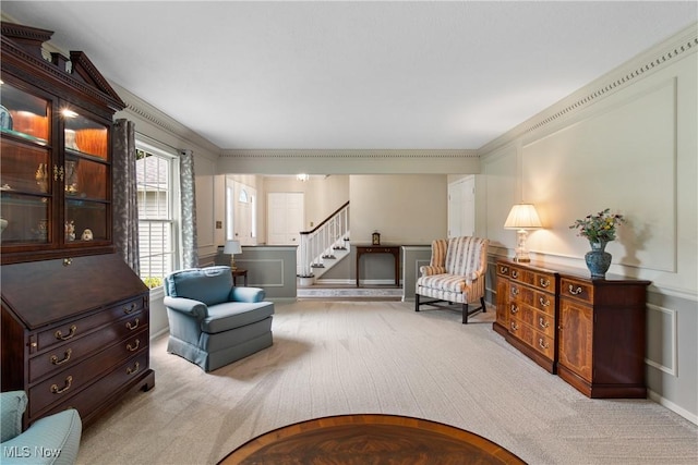 4270 Sir Robert Ave, North Royalton, OH 44133 - sitting room featuring carpet, stairway, and crown molding