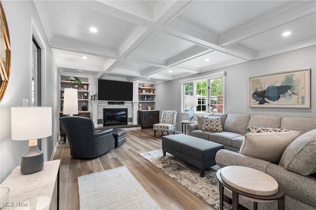 4270 Sir Robert Ave, North Royalton, OH 44133 - living room with wood finished floors, beam ceiling, a glass covered fireplace, recessed lighting, and ornamental molding