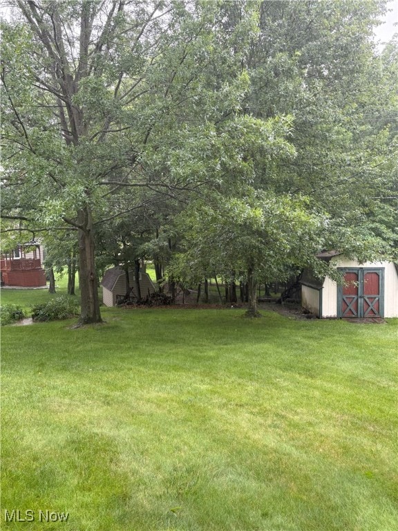 3611 Mark Dr, Broadview Heights, OH 44147 - view of green lawn with a storage shed