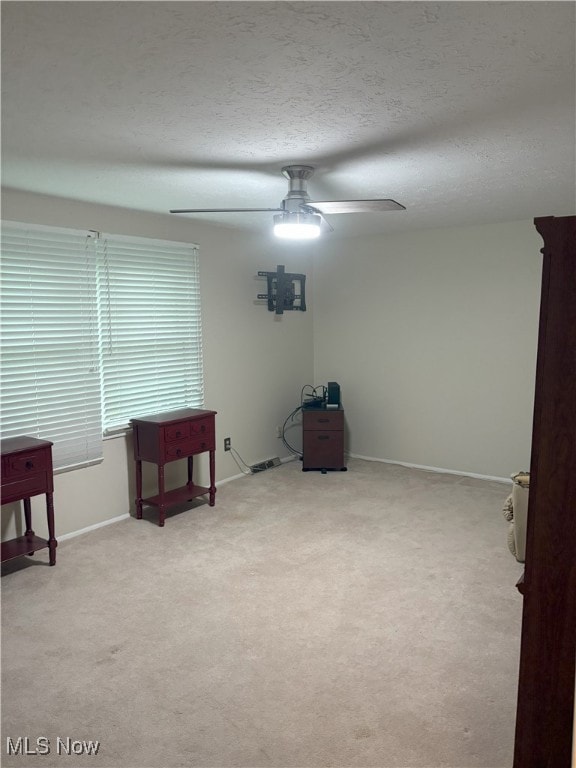 3611 Mark Dr, Broadview Heights, OH 44147 - sitting room with ceiling fan, light carpet, and a textured ceiling