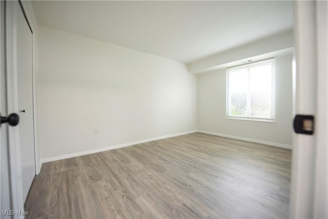 8507 Akins Rd Unit C-2, North Royalton, OH 44133 - empty room featuring wood finished floors and baseboards