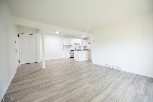 8507 Akins Rd Unit C-2, North Royalton, OH 44133 - unfurnished living room featuring light wood-type flooring