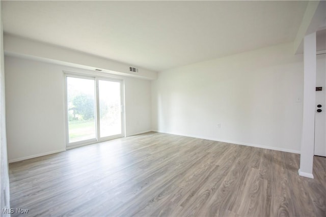 8507 Akins Rd Unit C-2, North Royalton, OH 44133 - unfurnished room with wood finished floors and baseboards