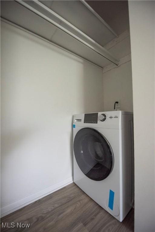 8507 Akins Rd Unit C-2, North Royalton, OH 44133 - laundry room featuring washer / clothes dryer and dark wood-style flooring