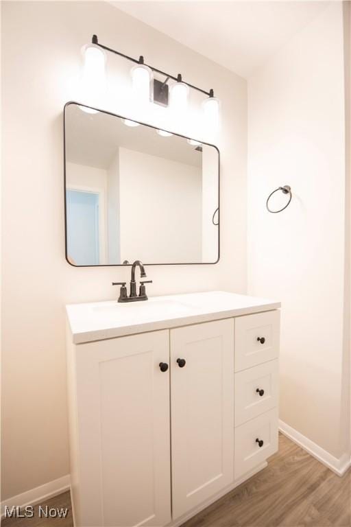 8507 Akins Rd Unit C-2, North Royalton, OH 44133 - bathroom featuring vanity and wood finished floors