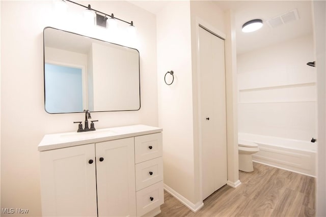 8507 Akins Rd Unit C-2, North Royalton, OH 44133 - full bath with wood finished floors and vanity