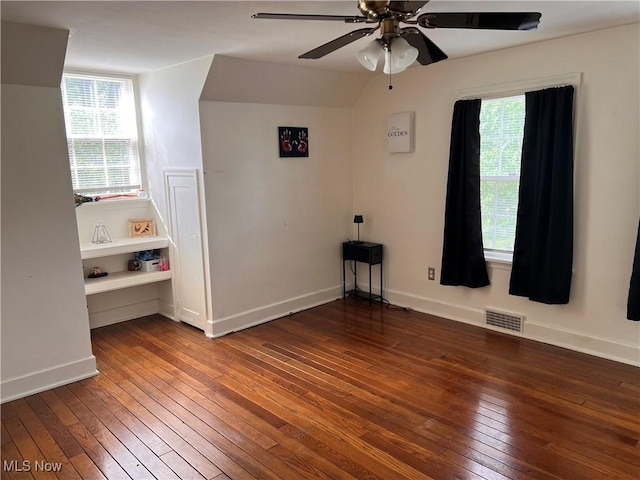 913 Home Cir, Salem, OH 44460 - empty room featuring wood-type flooring, a ceiling fan, and healthy amount of natural light