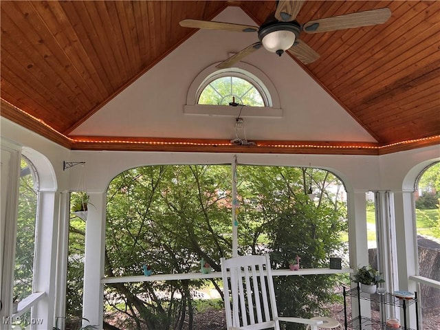 913 Home Cir, Salem, OH 44460 - unfurnished sunroom featuring vaulted ceiling, healthy amount of natural light, and arched walkways