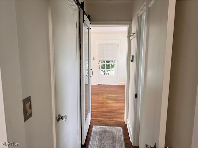913 Home Cir, Salem, OH 44460 - hall with dark wood-type flooring and a barn door