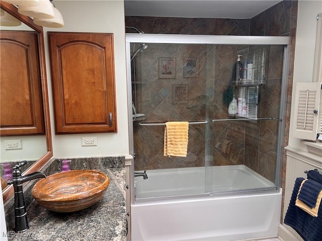 913 Home Cir, Salem, OH 44460 - full bathroom featuring shower / bath combination with glass door and vanity