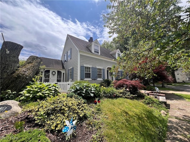 913 Home Cir, Salem, OH 44460 - view of side of home featuring a chimney and roof with shingles