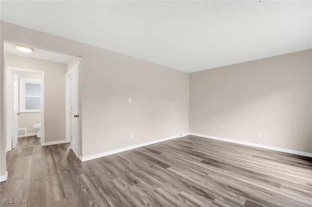 452 E 329th St, Willowick, OH 44095 - unfurnished room with wood finished floors and baseboards