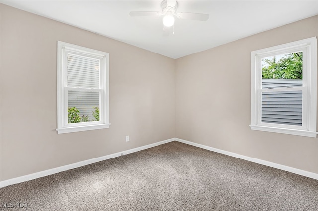 452 E 329th St, Willowick, OH 44095 - carpeted spare room with baseboards and a ceiling fan