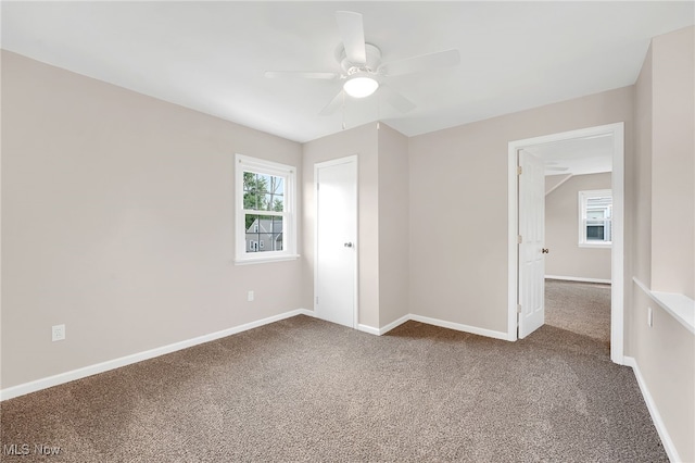 452 E 329th St, Willowick, OH 44095 - carpeted empty room with a ceiling fan and baseboards