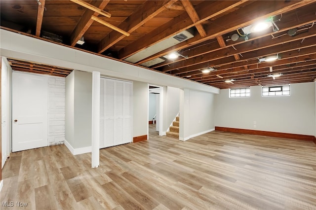 452 E 329th St, Willowick, OH 44095 - below grade area with wood finished floors and stairway