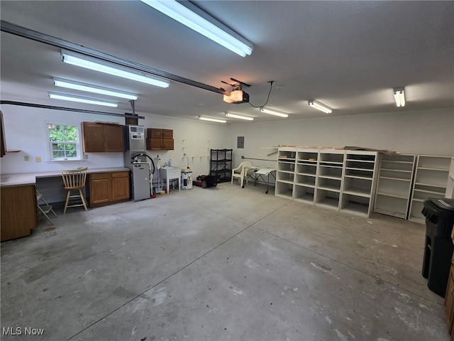 452 E 329th St, Willowick, OH 44095 - garage featuring a garage door opener